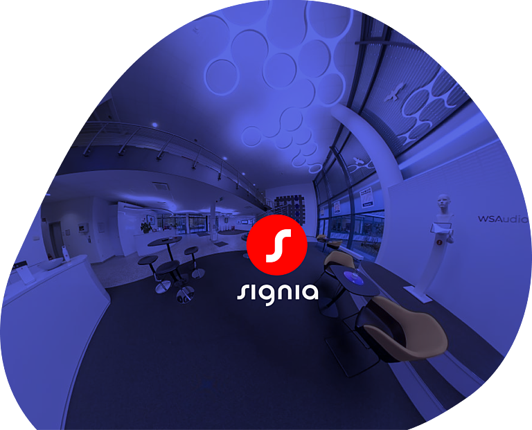 Innenansicht des modernen Signia-Foyers mit futuristischem Design und Logo im Zentrum – Symbol für digitale Markenkommunikation und interaktive Produkterlebnisse.